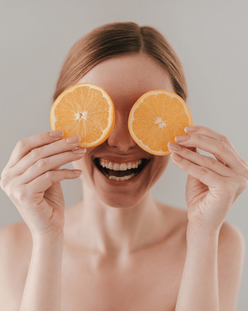 Smiling patient after treatment with the best chiropractor Elmers End at Bromley & Chislehurst Chiropractic, feeling relaxed and energised