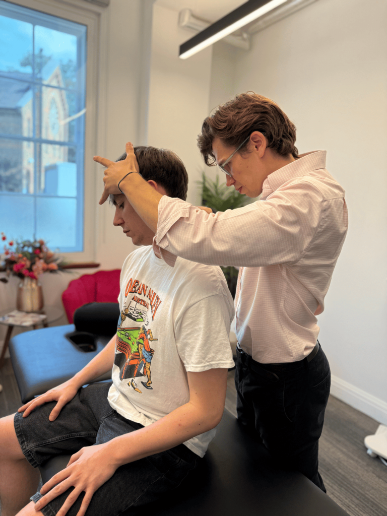 New patient consultation at Bromley & Chislehurst Chiropractic with the best chiropractor Elmers End explaining treatment process and assessment results