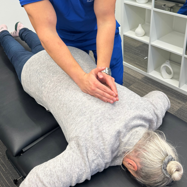 Our top chiropractor for Beckenham, Bromley and Chislehurst adjusting the mid back of one of our patients at Bromley and Chislehurst Chiropractic