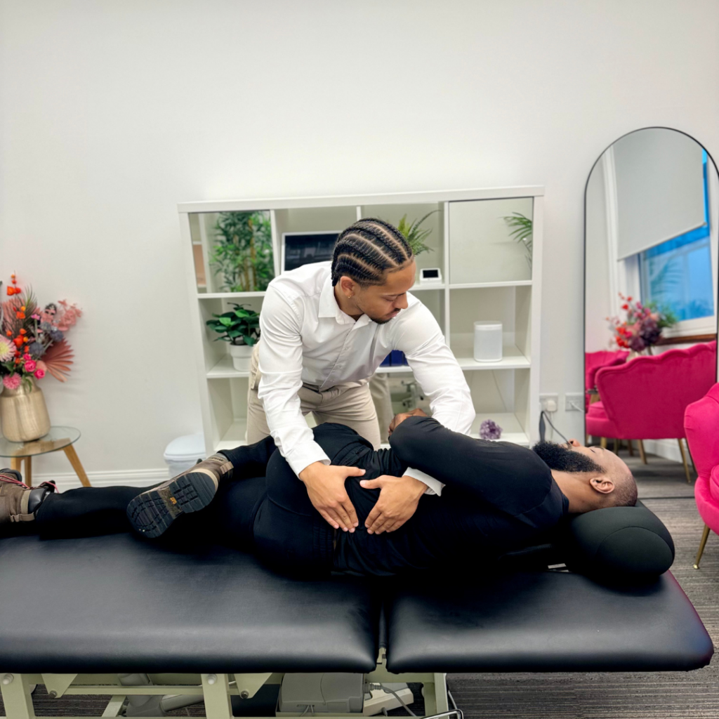 Our top Bromley, Beckenham and Chislehusrt Chiropractor giving one of our patients a lower back adjustment